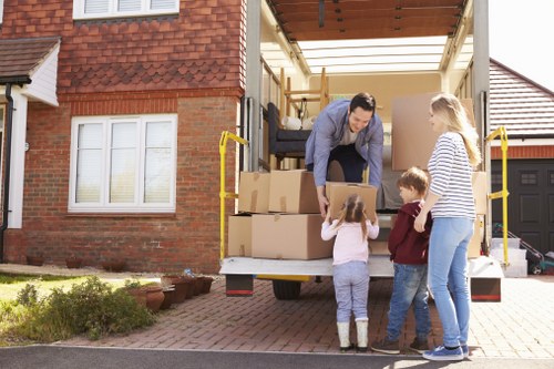 Removal van and packed boxes in a Wealdstone residential street