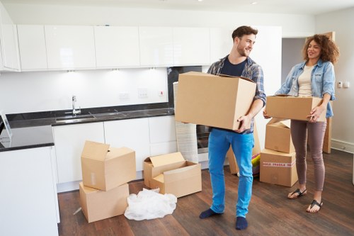 Packed boxes and furniture ready for a home removal in Wealdstone