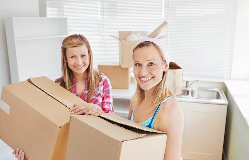 Furniture and boxes being loaded into a moving van in Wealdstone